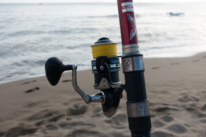 canna da pesca su spiaggia